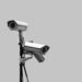 Black and white image of CCTV cameras looking in different directions