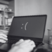 A person typing on a computer